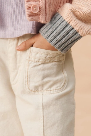 Брюки limited edition с расклешенными штанинами и контрастной строчкой- Заказать в России