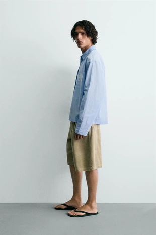 Рубашка Relaxed Fit в клетку с надписями- Заказать в России