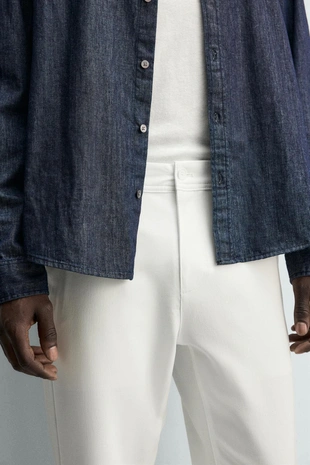 Брюки чинос из рельефной ткани с эластичностью- Заказать в России