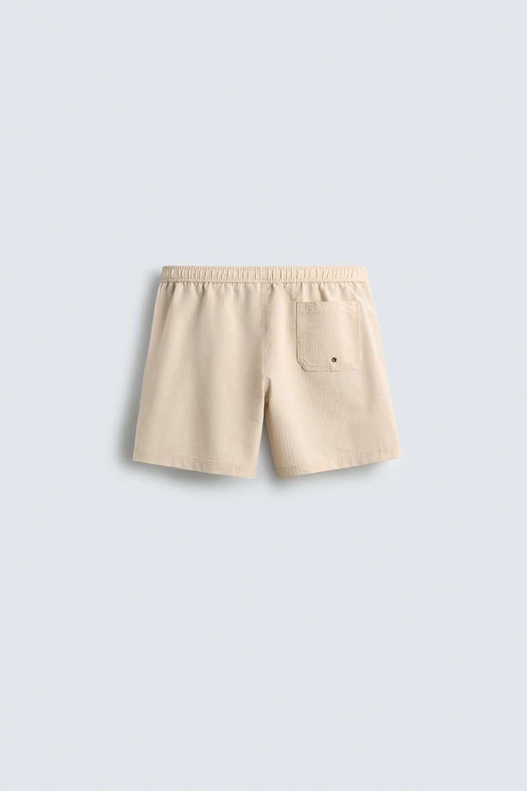 Полупрозрачные плавательные шорты из сизального материала