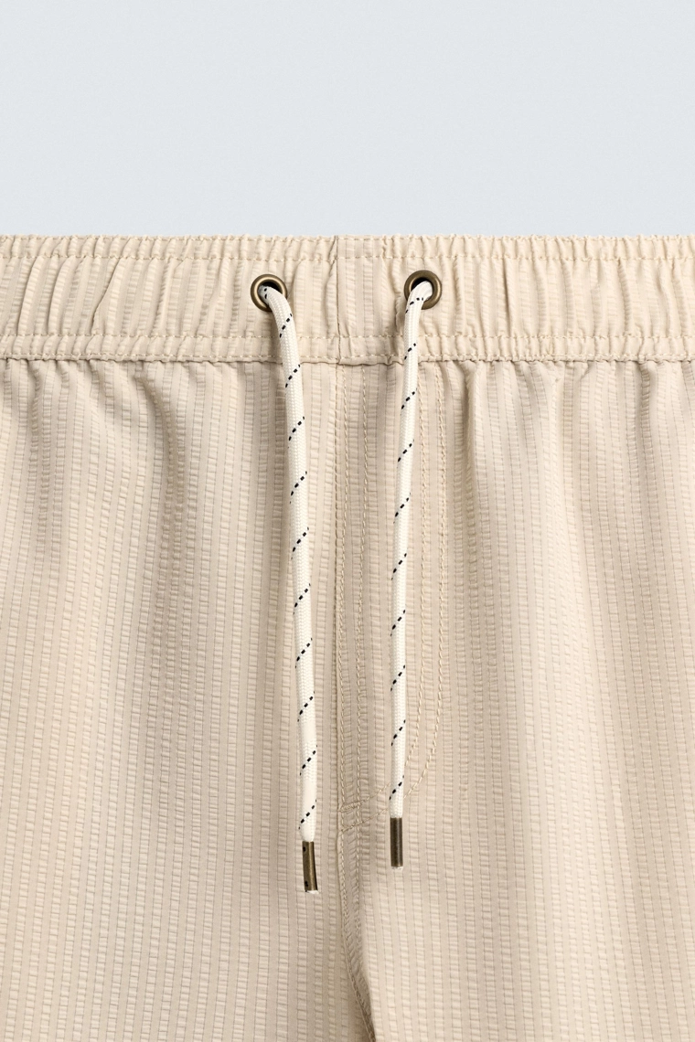 Полупрозрачные плавательные шорты из сизального материала