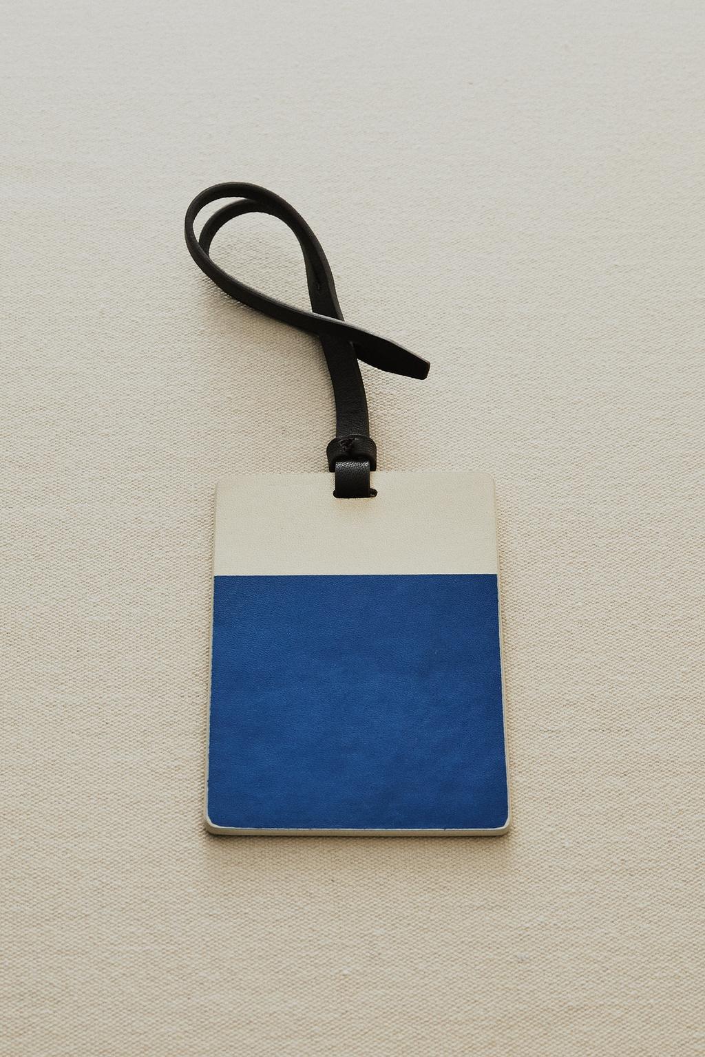 Кожаная бирка для багажа