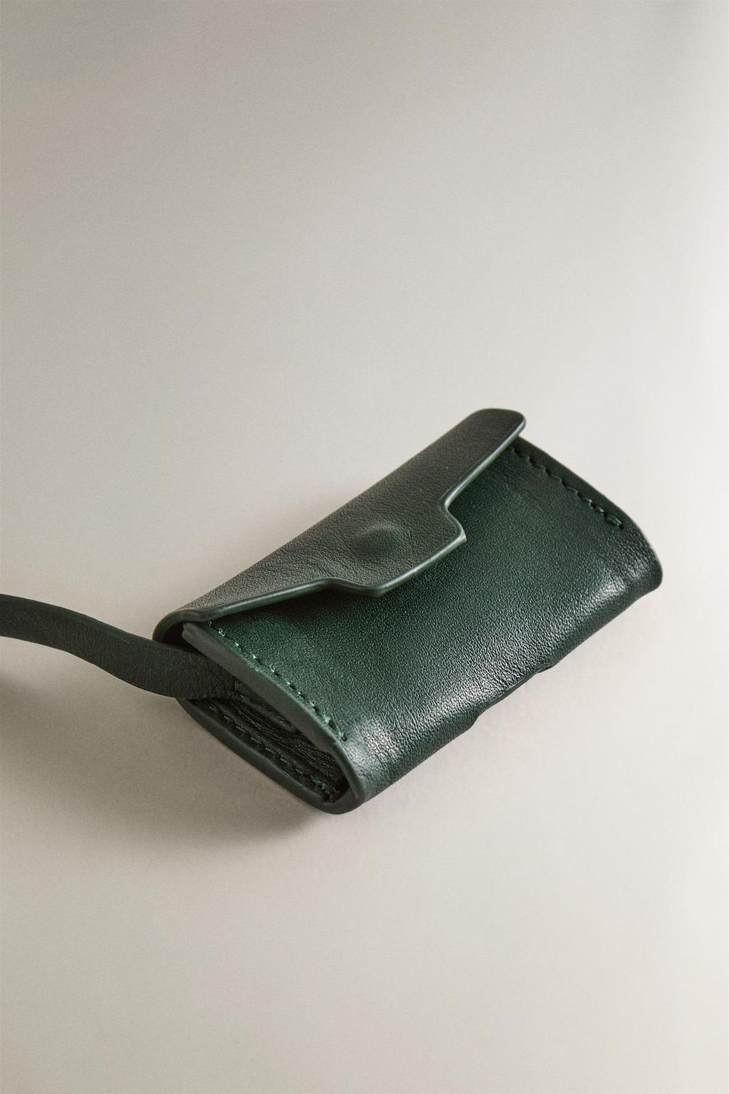 Диспенсер для мешков для домашних животных из кожи