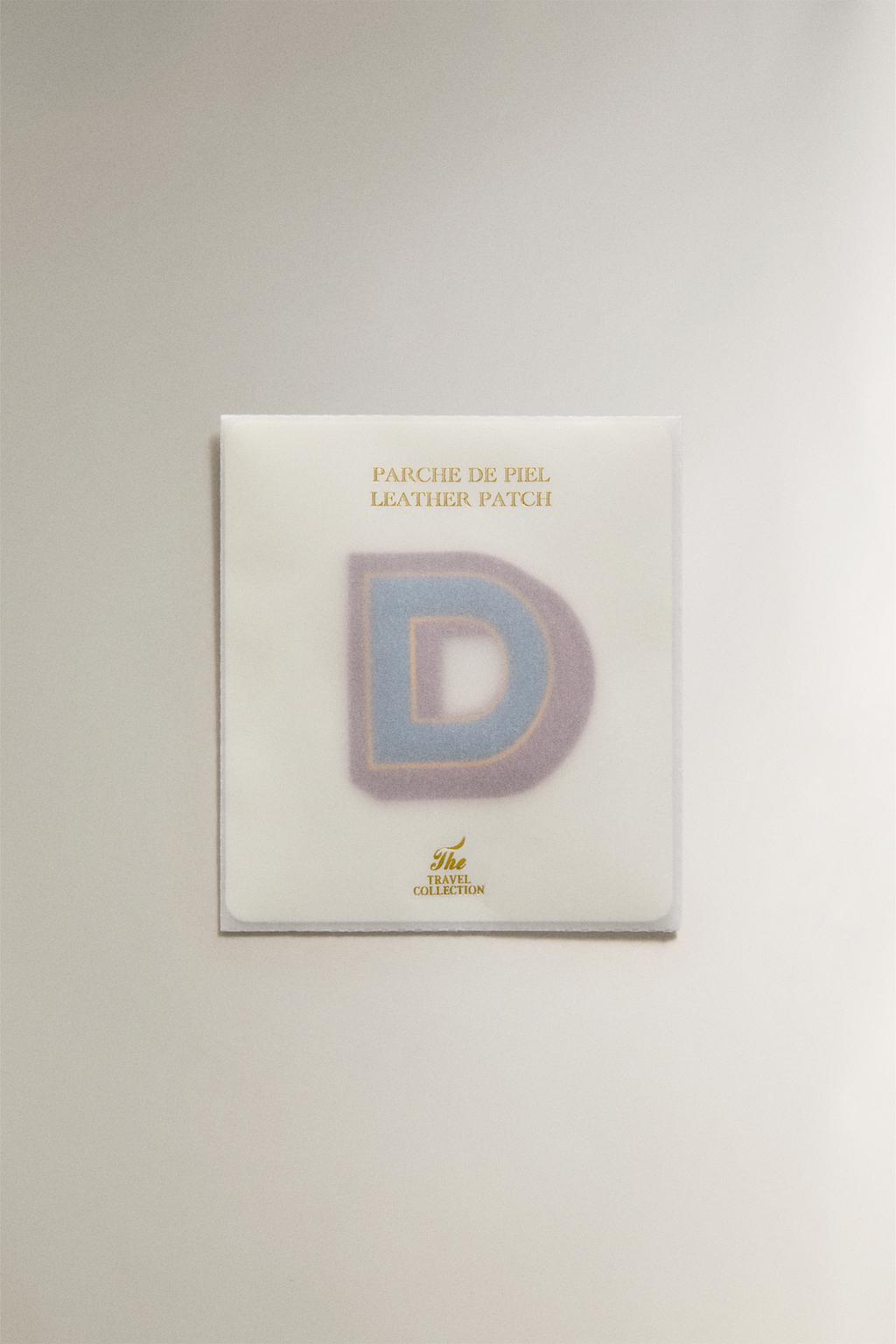 Наклейка из кожи с буквой d