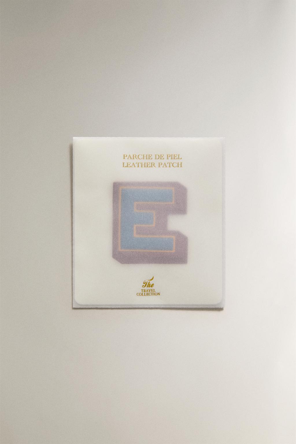 Нашивка из кожи с буквой е