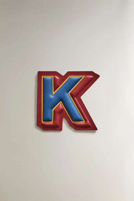 Нашивка из кожи с буквой k