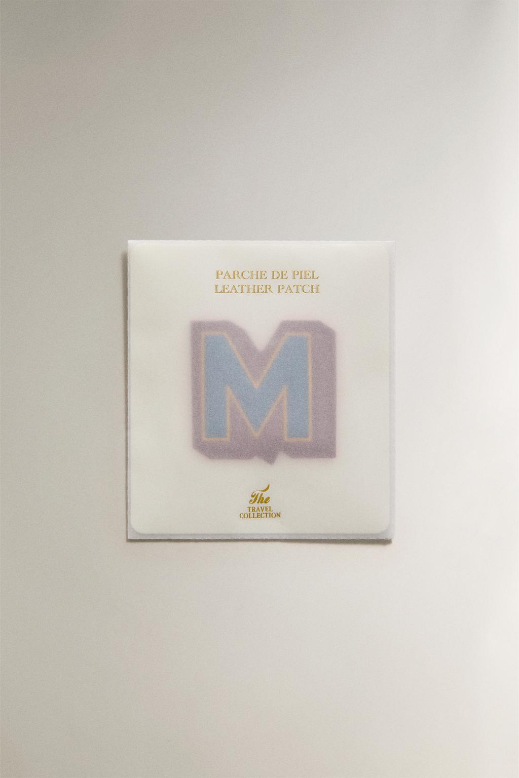 Термонаклейка из кожи с буквой m