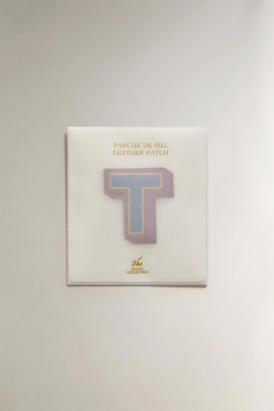 Термонакладка из кожи с буквой t- Заказать в России