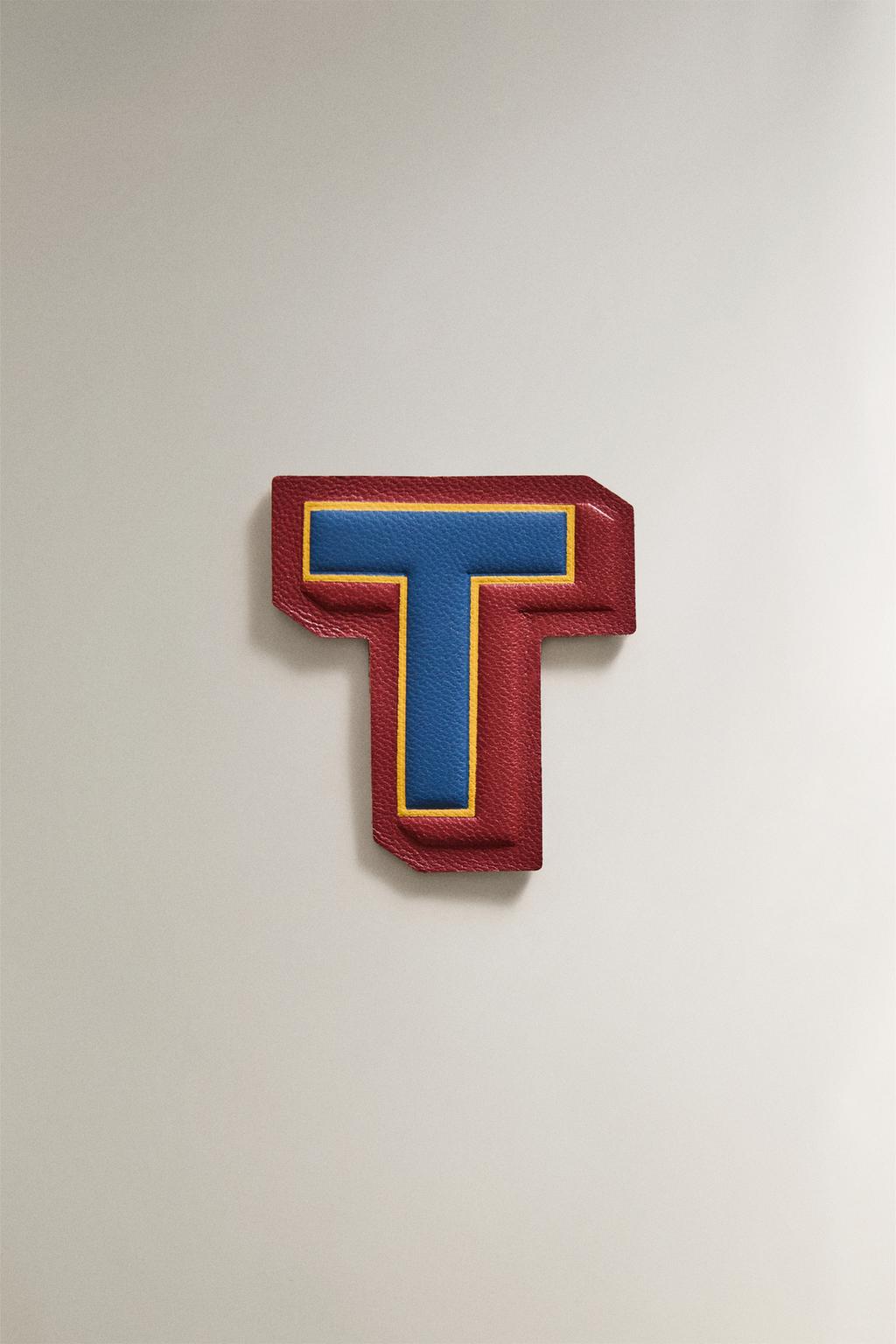 Термонакладка из кожи с буквой t