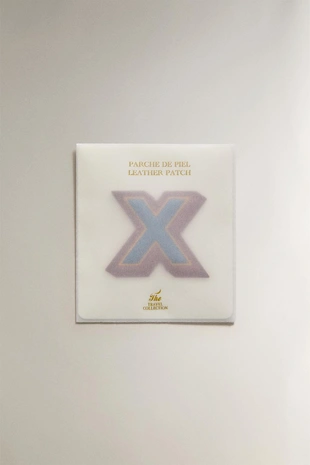 Нашивка из кожи с буквой х- Заказать в России