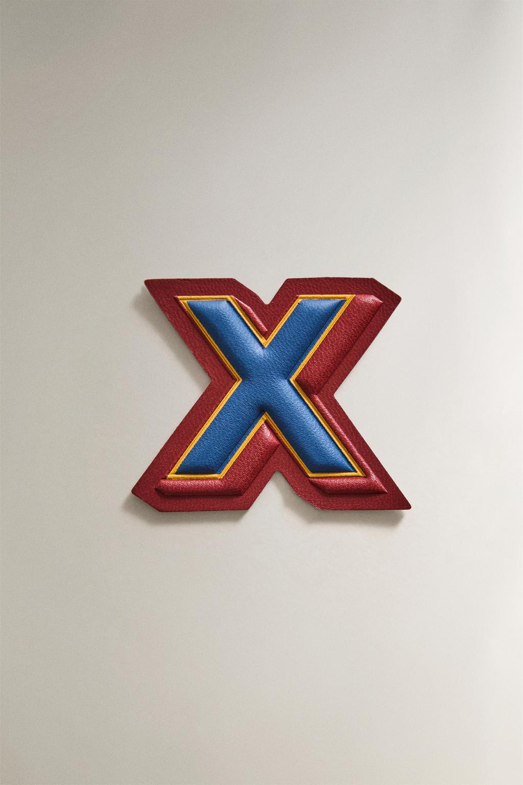 Нашивка из кожи с буквой х