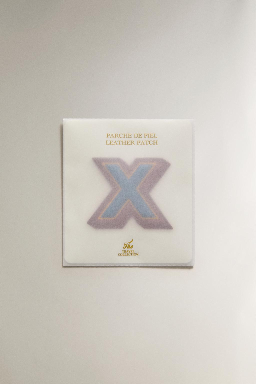 Нашивка из кожи с буквой х