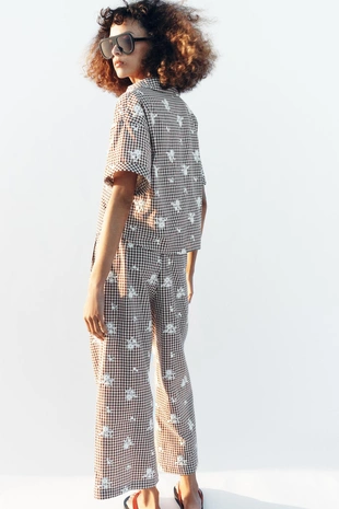 Брюки-кюлоты в клетку с вышивкой- Заказать в России