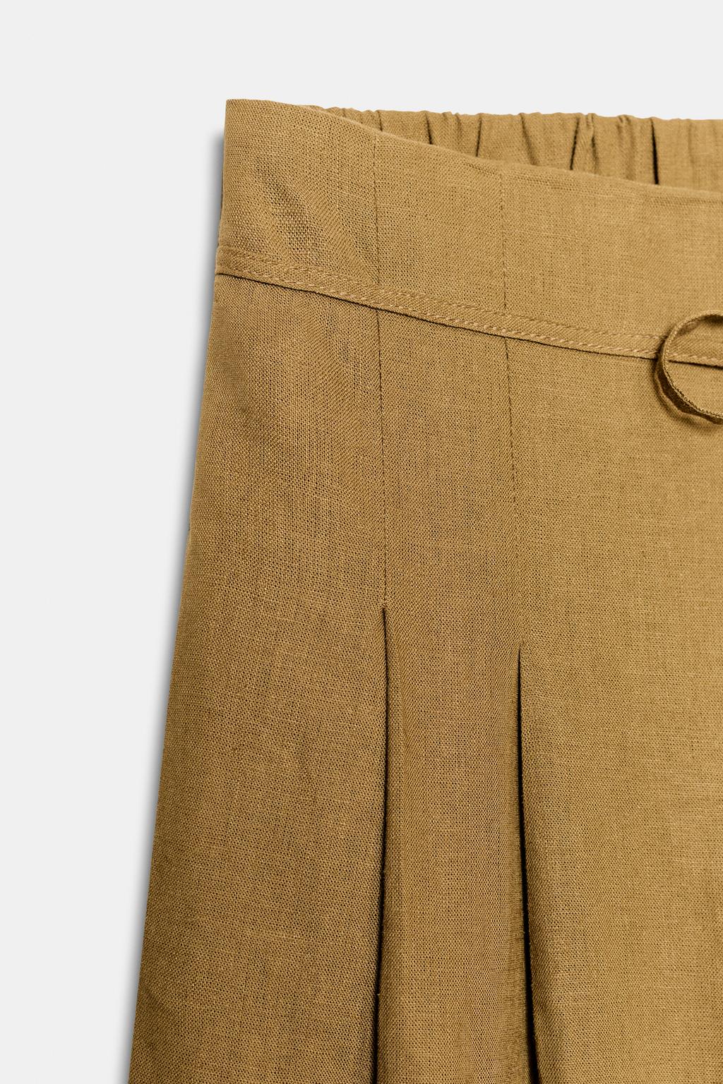 Широкие брюки с линиями стрелок