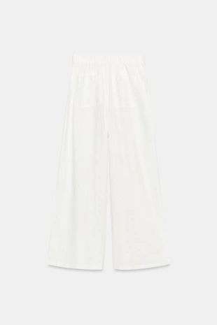 Широкие брюки с защипами