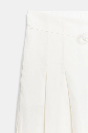 Широкие брюки с защипами