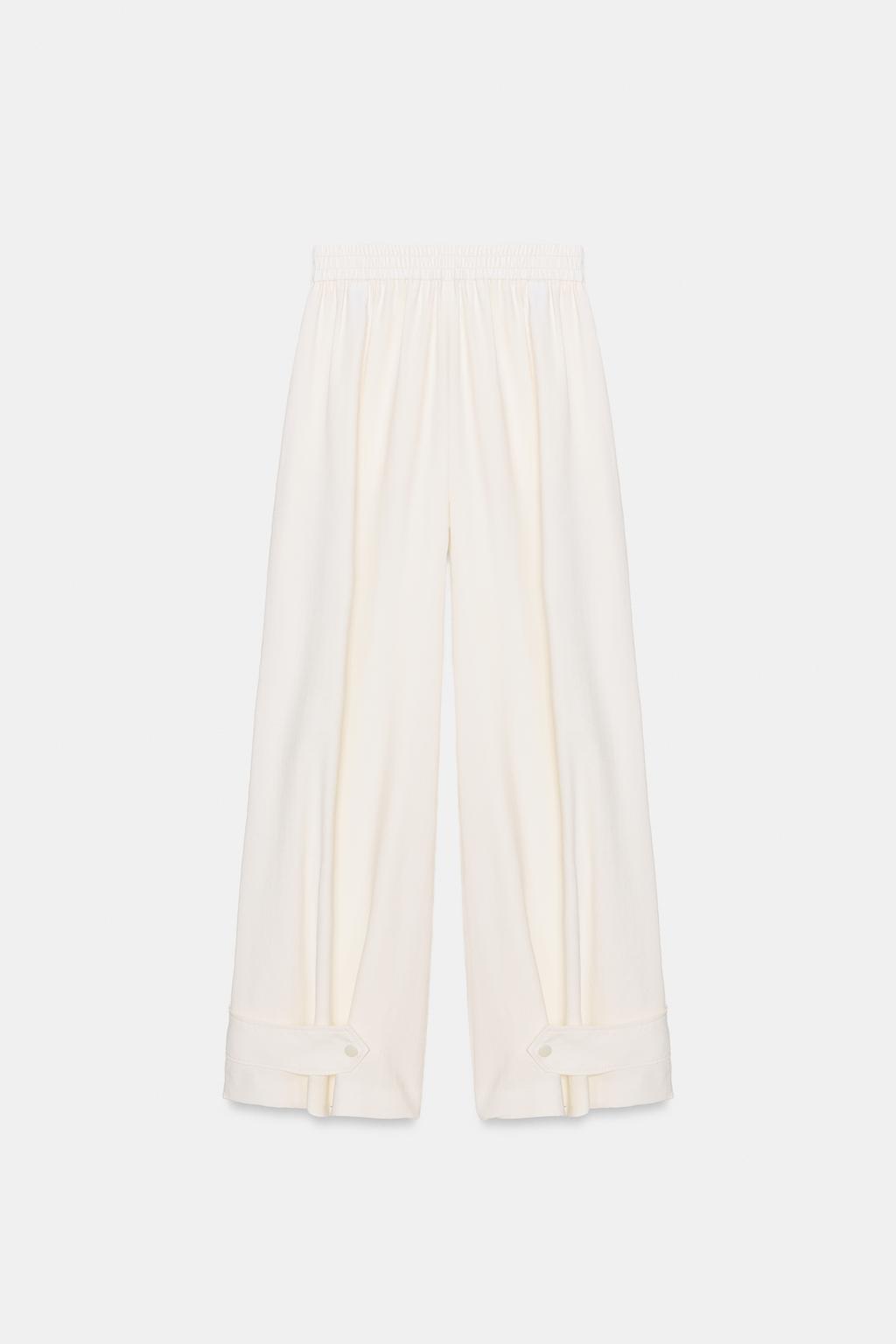 БРЮКИ СВОБОДНОГО КРОЯ С РЕГУЛИРУЕМЫМИ МАНЖЕТАМИ