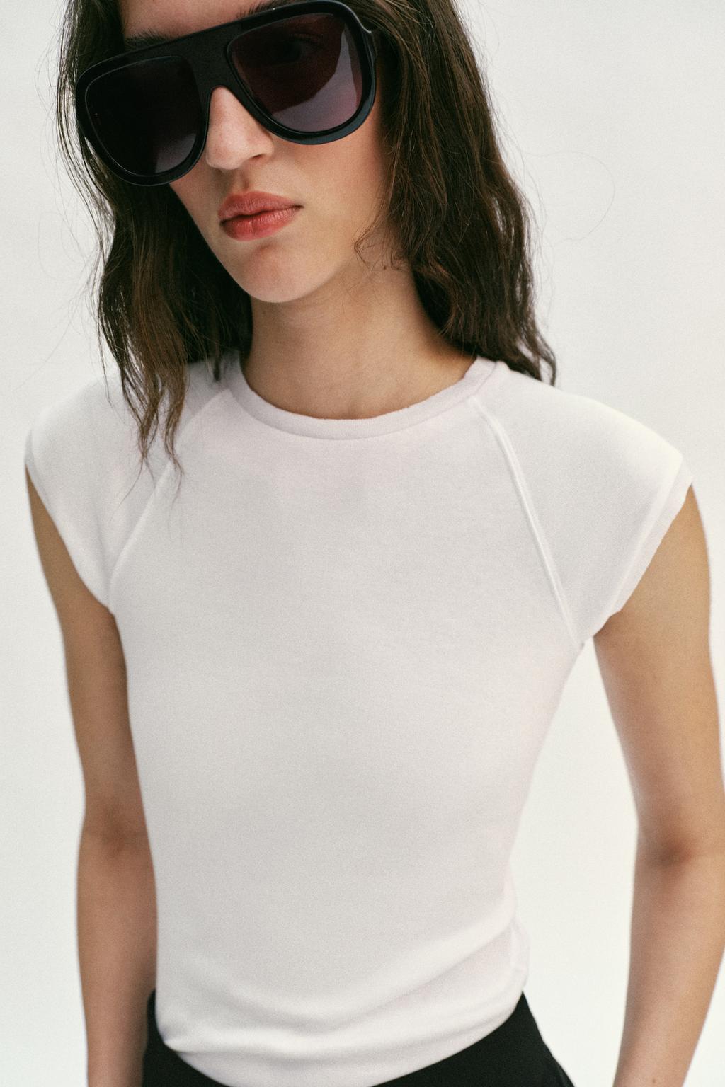 ФУТБОЛКА С ЭФФЕКТОМ ПОТЕРТОСТИ И РЕГЛАНОМ