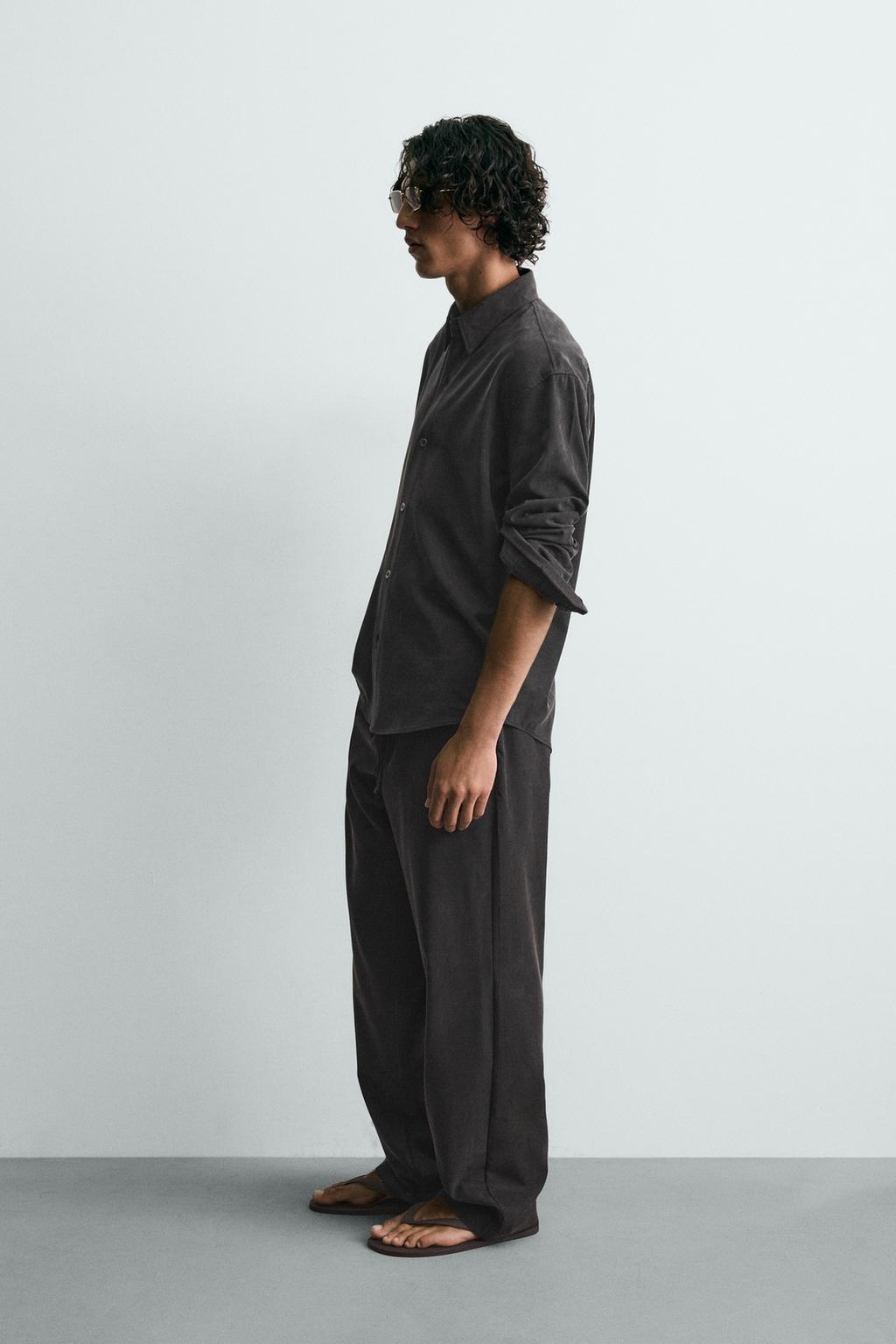 СТРУЯЩИЕСЯ БРЮКИ RELAXED FIT