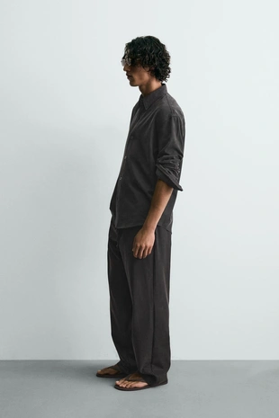 Струящиеся брюки Relaxed Fit- Заказать в России