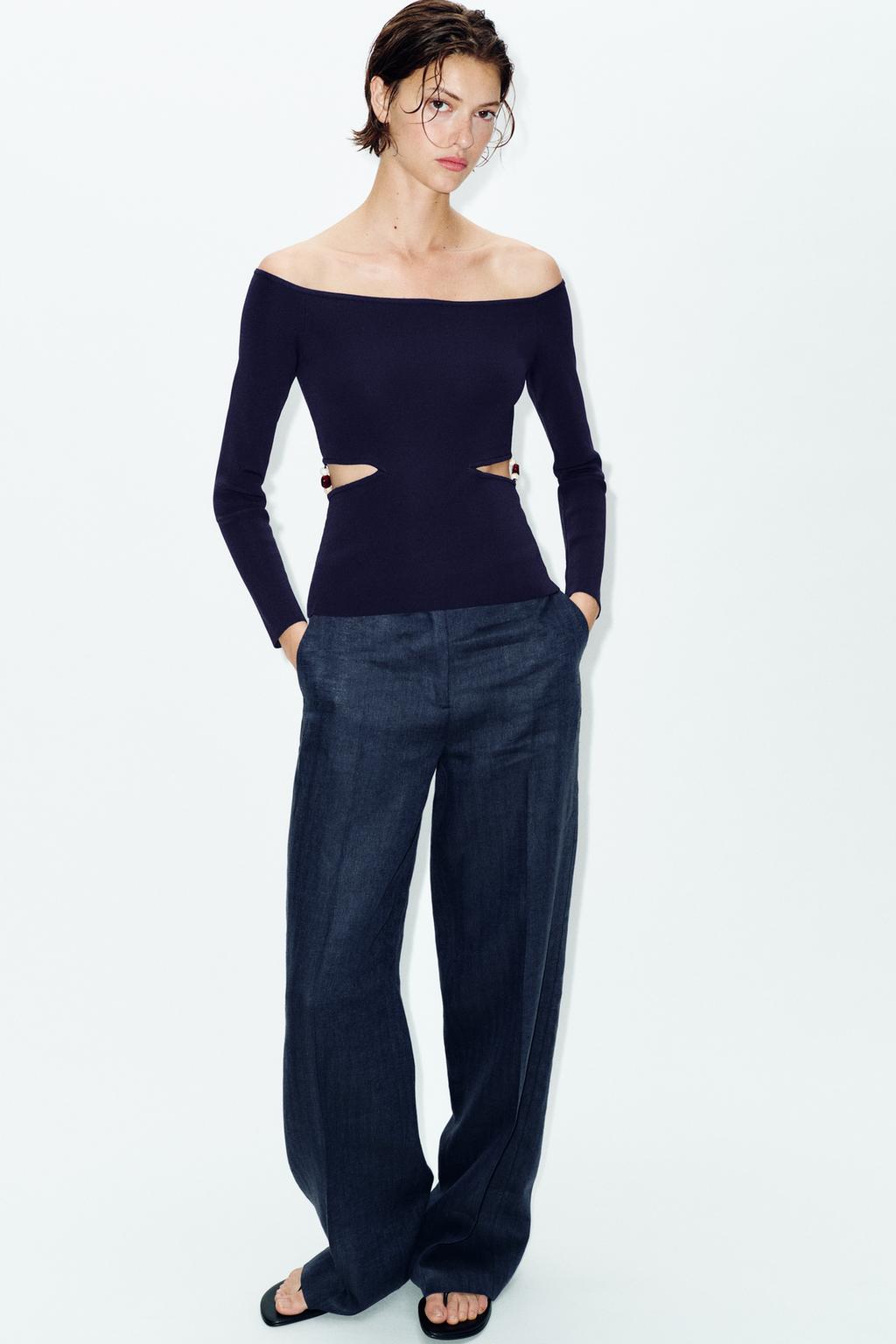 ТРИКОТАЖНЫЙ ТОП С ВЫРЕЗАМИ И БУСИНАМИ