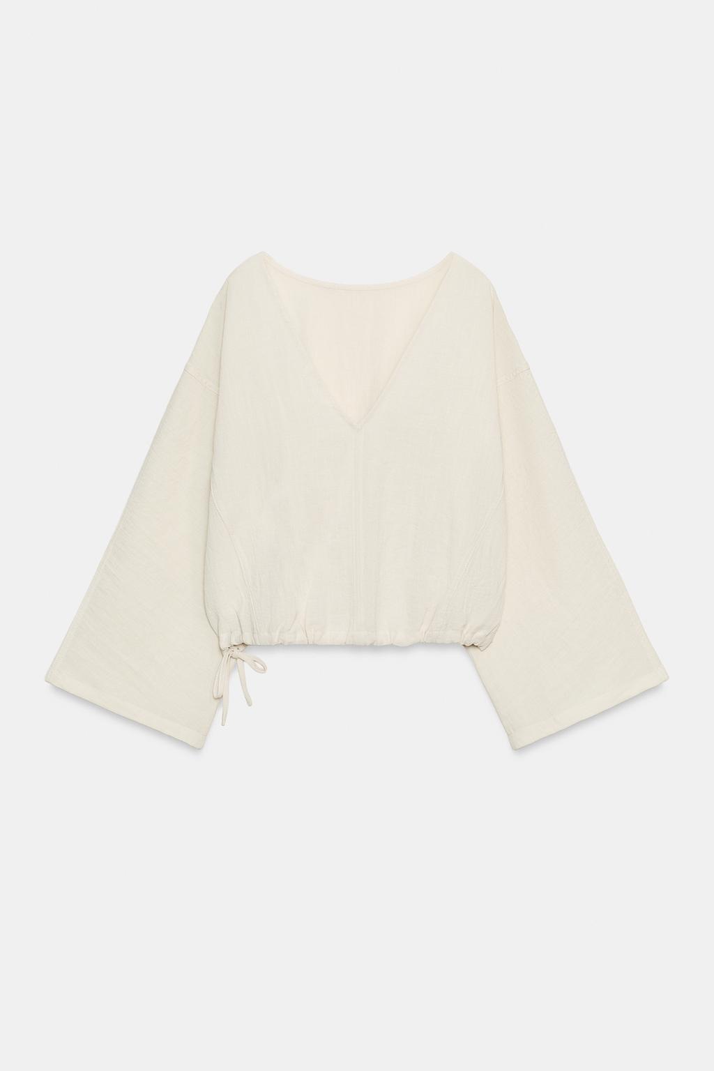 Рубашка с кейпом и застежкой на пуговицы