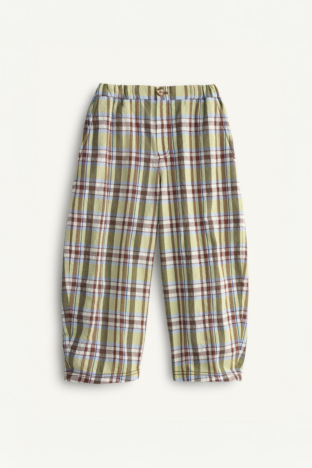 Брюки в клетку limited edition с контрастным карманом