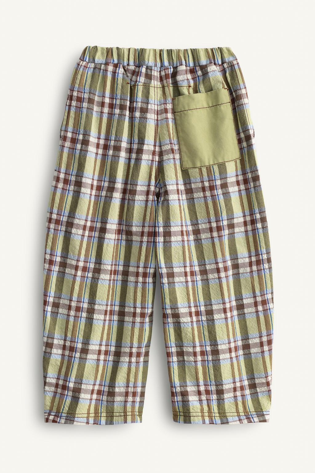 Брюки в клетку limited edition с контрастным карманом