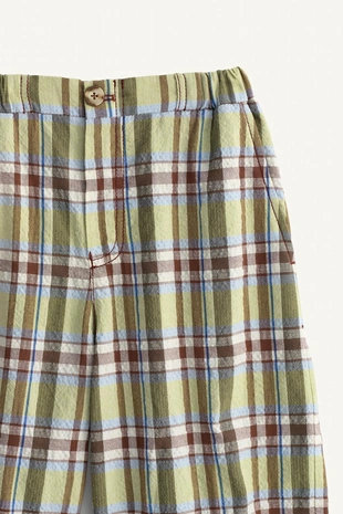 Брюки в клетку limited edition с контрастным карманом- Заказать в России