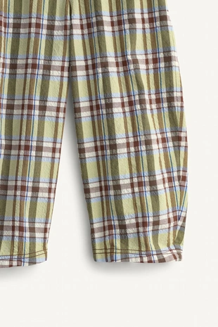 Брюки в клетку limited edition с контрастным карманом- Заказать в России