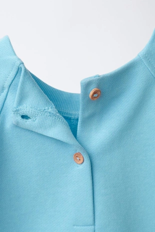 Короткий комбинезон из футера