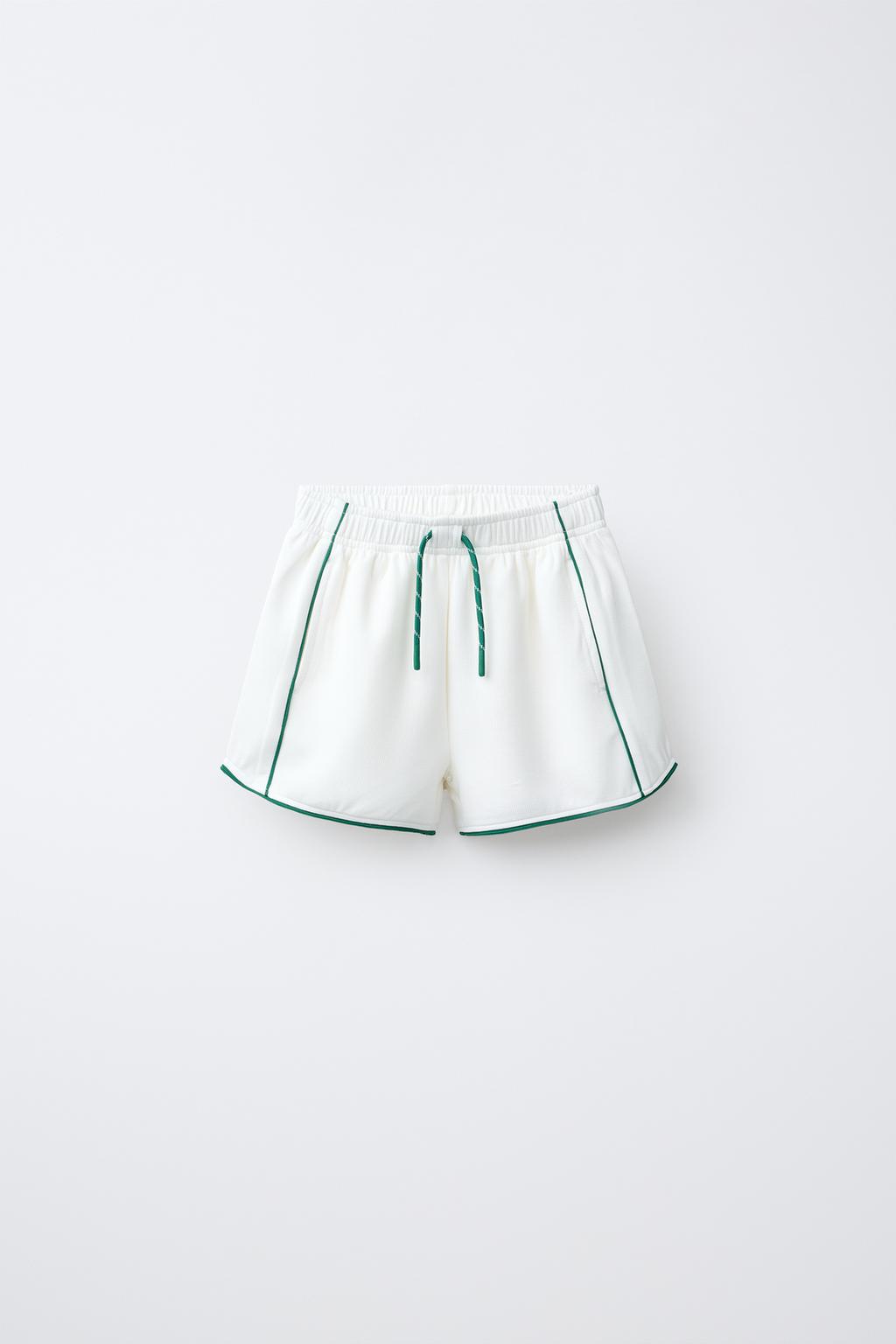 ШОРТЫ-БЕРМУДЫ В РУБЧИК С КОНТРАСТНЫМИ ДЕТАЛЯМИ