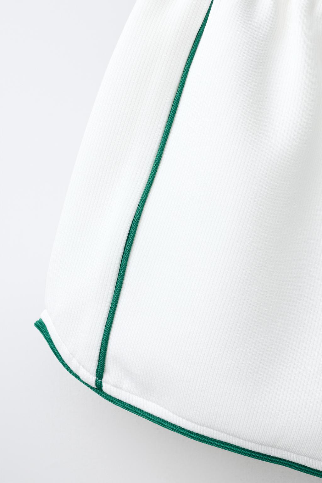 ШОРТЫ-БЕРМУДЫ В РУБЧИК С КОНТРАСТНЫМИ ДЕТАЛЯМИ