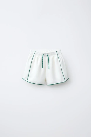 Шорты-бермуды в рубчик с контрастными деталями- Заказать в России