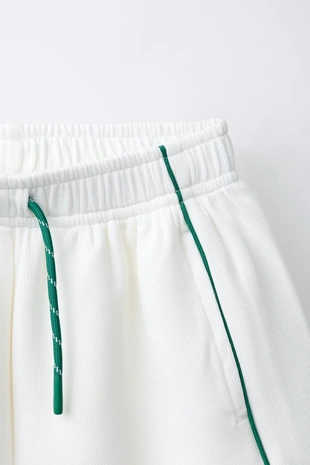 Шорты-бермуды в рубчик с контрастными деталями- Заказать в России