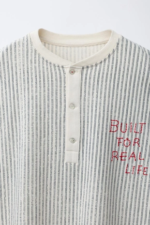 Футболка в полоску с нашивкой- Заказать в России