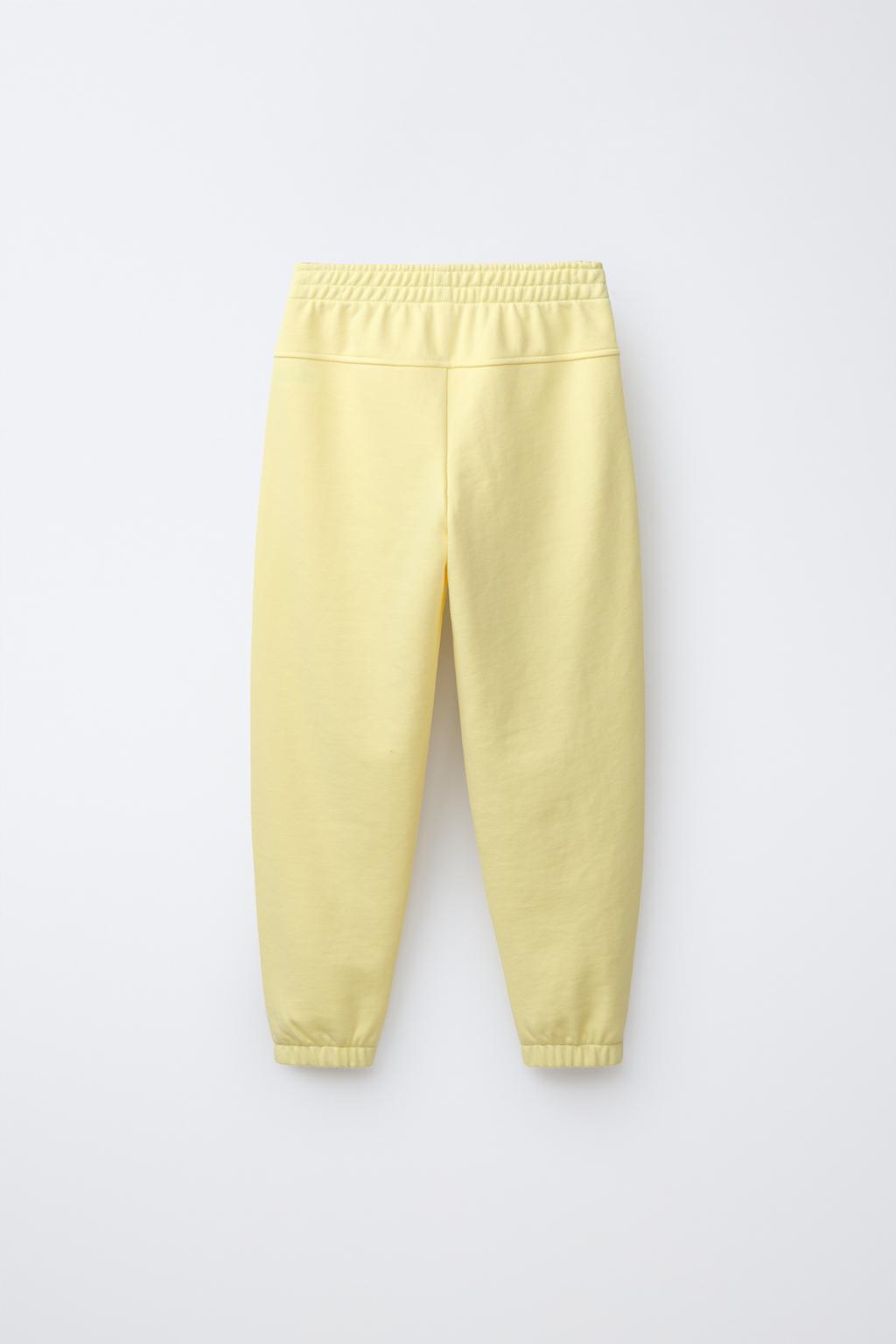 БРЮКИ-ДЖОГГЕРЫ С НАДПИСЬЮ