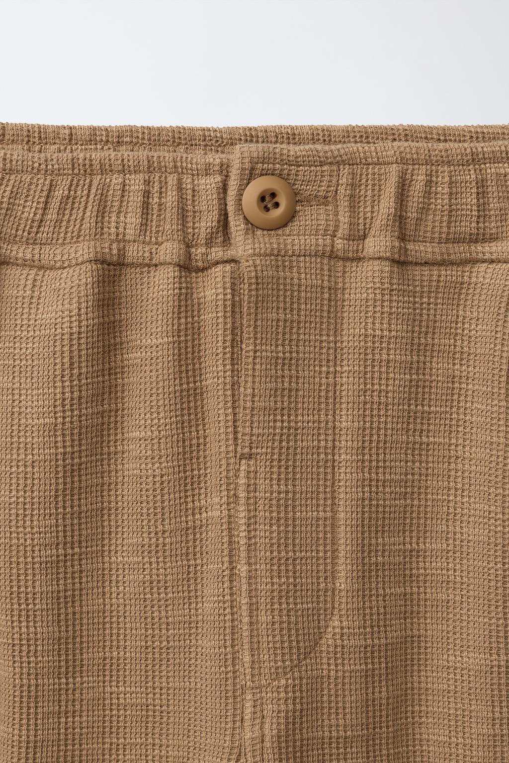 БРЮКИ ИЗ РЕЛЬЕФНОЙ ТКАНИ