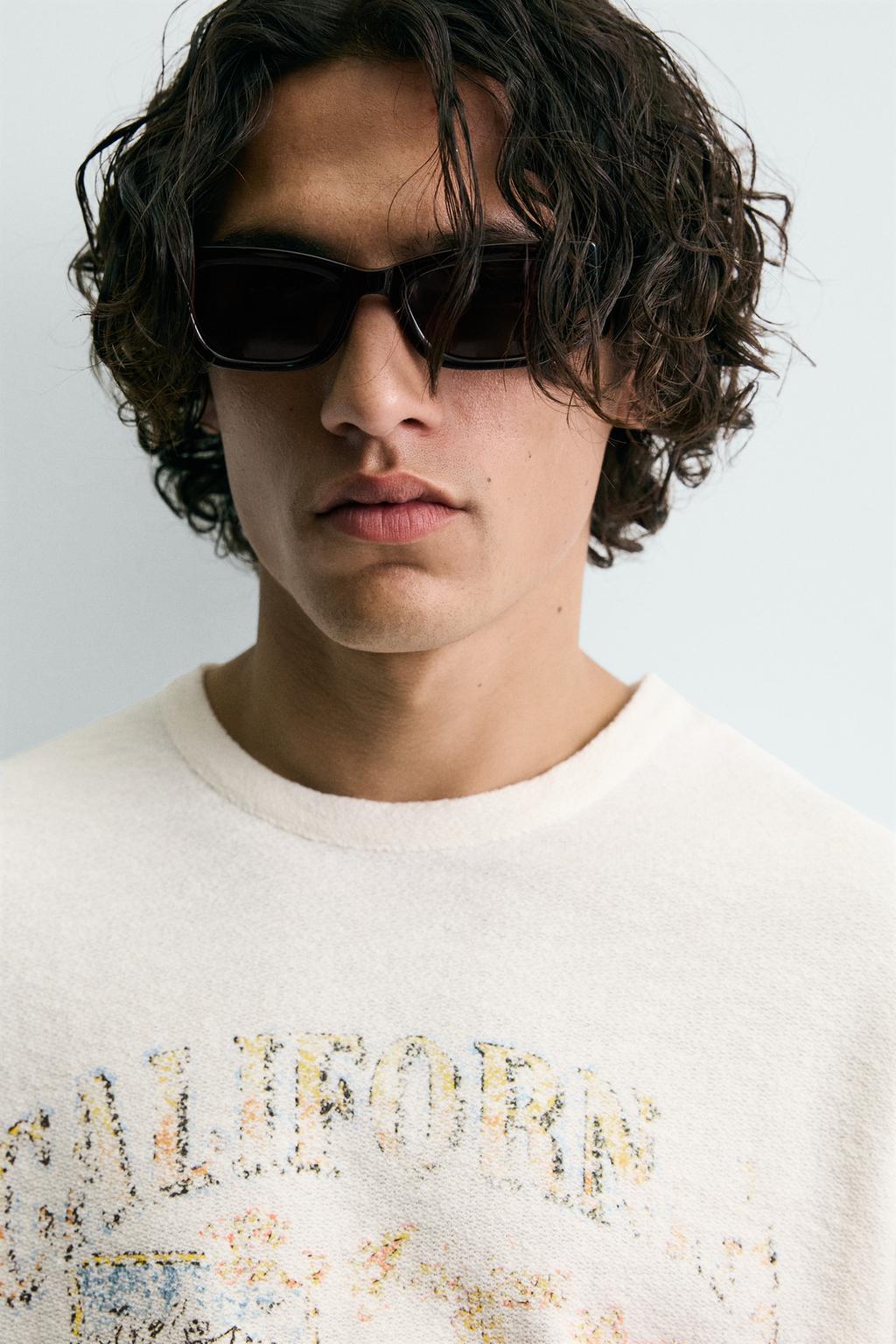 ФУТБОЛКА С ПРИНТОМ И ЭФФЕКТОМ ПОТЕРТОСТИ