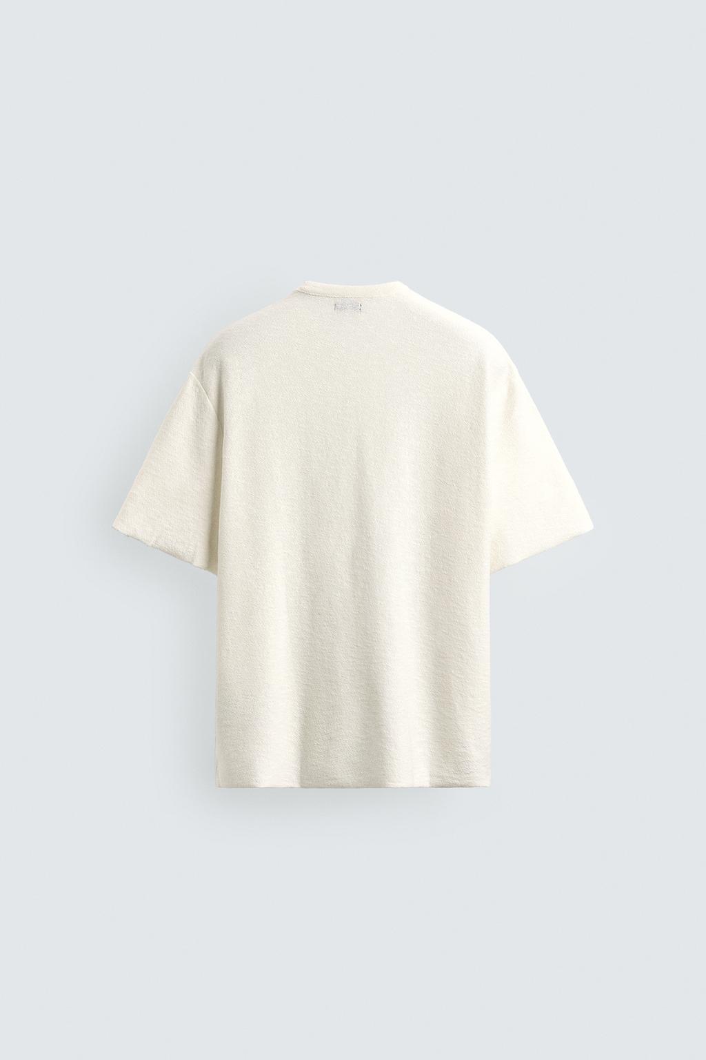 ФУТБОЛКА С ПРИНТОМ И ЭФФЕКТОМ ПОТЕРТОСТИ