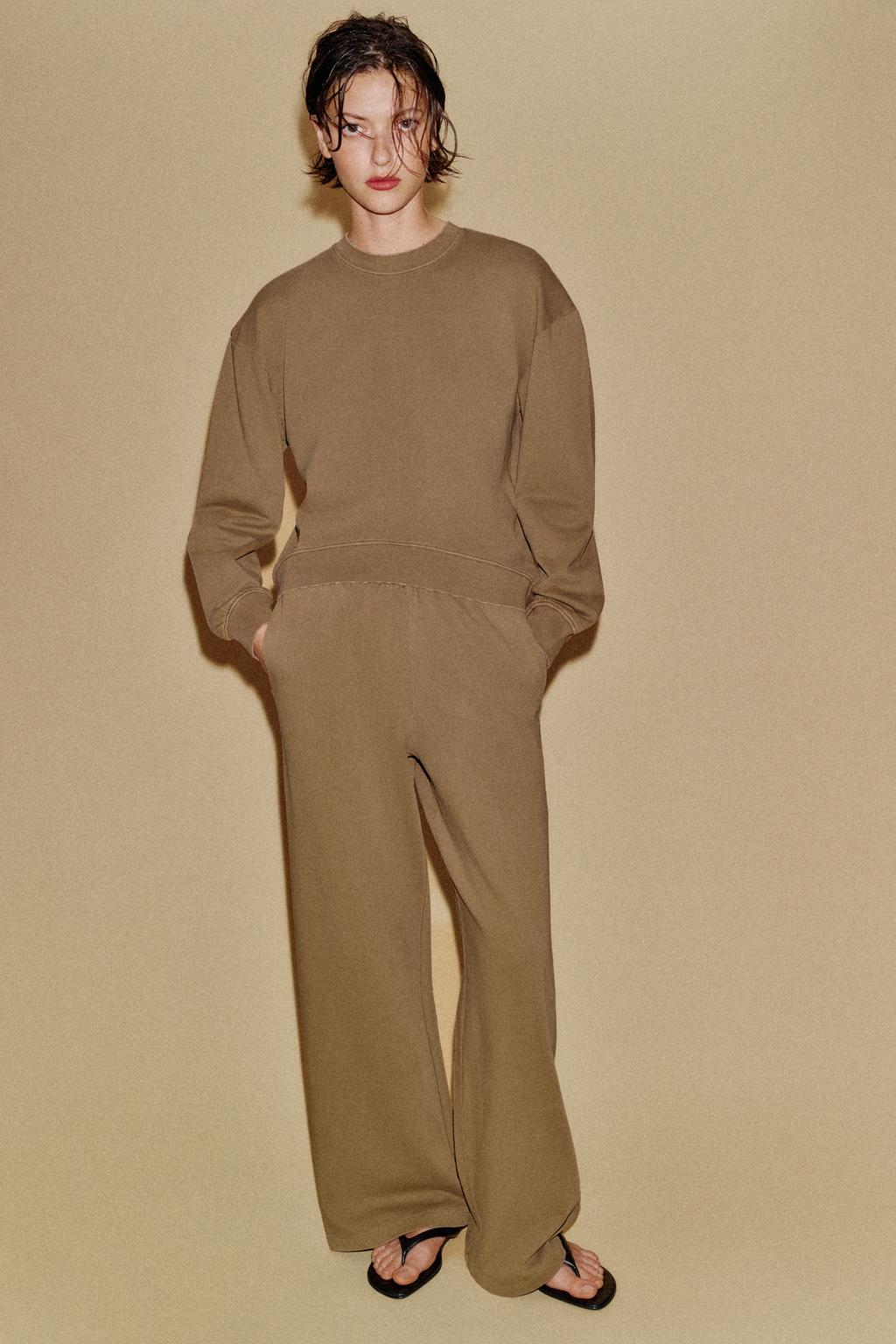 ШИРОКИЕ БРЮКИ С ЭФФЕКТОМ ПОТЕРТОСТИ