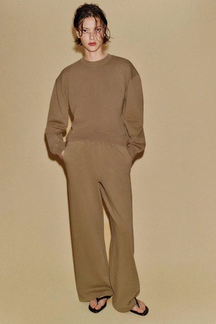 Широкие брюки с эффектом потертости- Заказать в России