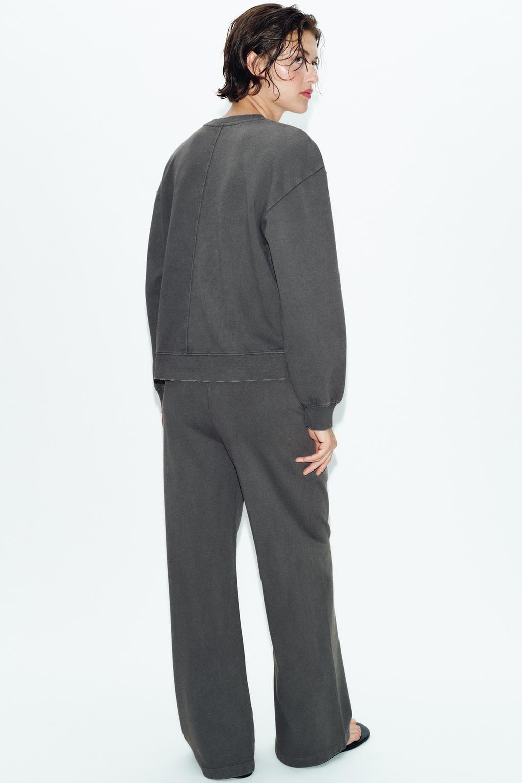 ШИРОКИЕ БРЮКИ С ЭФФЕКТОМ ПОТЕРТОСТИ