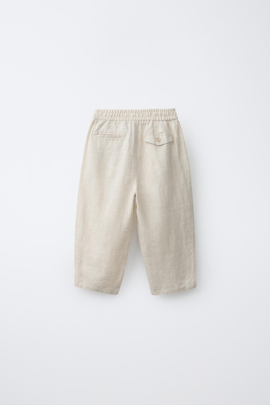 БРЮКИ С ЗАЩИПАМИ ИЗ 100% ЛЬНА