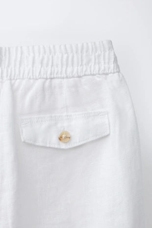 Брюки со складками из 100% льна- Заказать в России