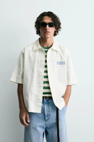 Рубашка с контрастным принтом и эффектом потертости