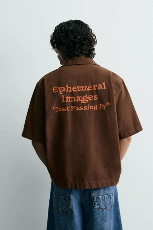 Рубашка с контрастным принтом и эффектом потертости