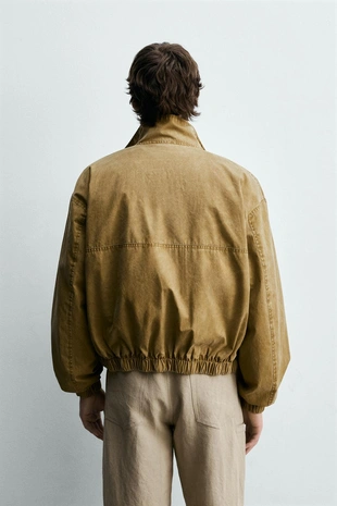 Укороченная куртка с эффектом потертости