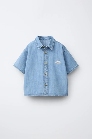 Джинсовая рубашка с нашивкой- Заказать в России