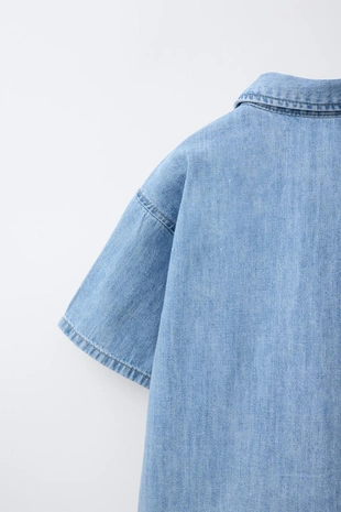 Джинсовая рубашка с нашивкой- Заказать в России